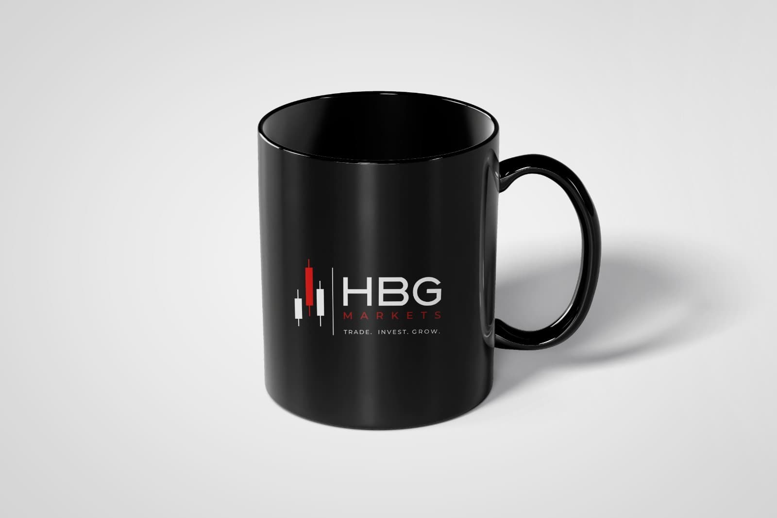 Mug negro con logo HBG Markets en rojo y blanco